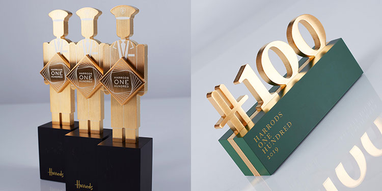 Harrods 100 staff recognition custom trophies featuring doormen and logo